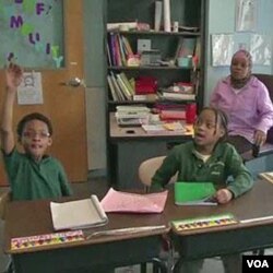 Warga keturunan Afrika belajar di sebuah sekolah di Baltimore, Maryland. Masih banyak warga kulit hitam AS yang tertinggal dalam bidang pendidikan.