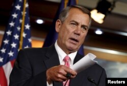 FILE - House Speaker John Boehner contends the White House has 'no overarching strategy' to cope with threats..