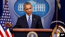 President Barack Obama speaks during a news conference in the briefing room of the White House in Washington, Dec. 16, 2016. 