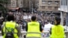 Students and other anti-government protesters block access to the offices of state broadcaster Radio Television of Serbia (RTS), keeping employees out and forcing some of its live programming to go off air, in Belgrade, Serbia, March 11, 2025.