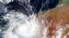 Sebuah citra satelit yang dirilis NASA pada Minggu 11 April 2021 menunjukkan Topan Tropis Seroja di atas pantai Australia Barat. (NASA Worldview, EOSDIS via AP)