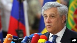 European Parliament President Antonio Tajani speaks with the media as he arrives for an EU summit in Brussels, June 22, 2017.