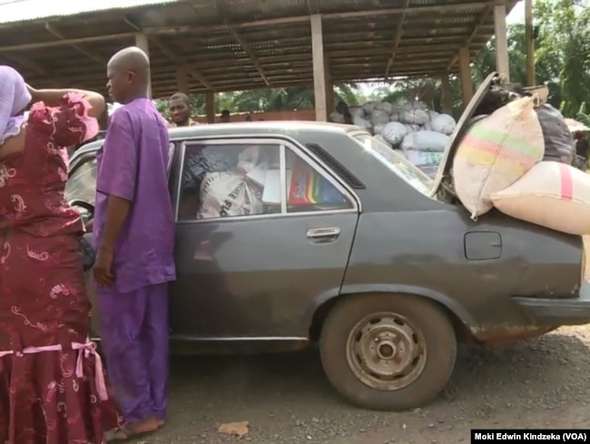 A car filled with supplies to sell across the border is seen in Ekok, a Cameroonian village on the southwestern border with Nigeria.