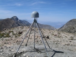 FILE - A GPS station is seen in the Inyo Mountains of California. (S. Lawrence/UNAVCO)