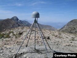 FILE - A GPS station is seen in the Inyo Mountains of California. (S. Lawrence/UNAVCO)
