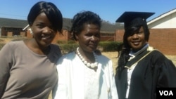 FILE: One of the capped graduands with relatives and friends at Chinhoyi University. (Phot: Arthur Chigoriwa)