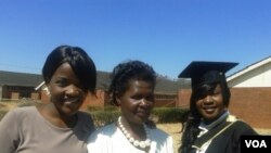 FILE: One of the capped graduands with relatives and friends at Chinhoyi University. (Phot: Arthur Chigoriwa)