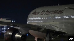 A plane with three American citizens, Mark Swidan, Kai Li and John Leung, who were imprisoned for years by China, arrives at Joint Base San Antonio Lackland, in San Antonio, Nov. 27, 2024. 