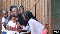 Esther Njau gave birth to her daughter Marie five months ago. (Hilary Heuler/VOA News)