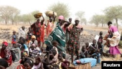 FILE: Women and children wait to be treated at a Medecins Sans Frontieres (MSF) support clinic in Thaker, Southern Unity, South Sudan. Taken Mar.20, 2017.