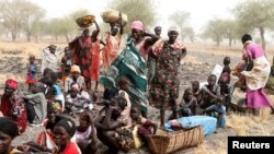 FILE - Women and children wait to be treated at a Medecins Sans Frontieres (MSF) support clinic in Thaker, Southern Unity, South Sudan, March 20, 2017. The Trump administration's expansion of the global gag rule could disrupt hundreds of clinics in Africa and around the world that fight AIDs and malaria.