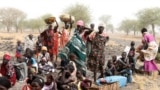 FILE: Women and children wait to be treated at a Medecins Sans Frontieres (MSF) support clinic in Thaker, Southern Unity, South Sudan. Taken Mar.20, 2017.