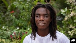 Tyrone Iras Marhguy, 17, poses for a photograph at his home in Accra, Ghana, Oct. 10, 2021. 