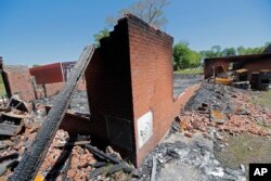 The burnt ruins of the St. Mary Baptist Church, one of three that recently burned down in St. Landry Parish, are seen in Port Barre, La., Apr. 10, 2019.