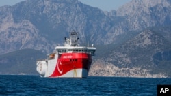 FILE - Turkey's exploratory vessel, the Oruc Reis, is seen anchored in the Mediterranean, off the coast of Antalya, Turkey, July 24, 2020.