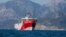 FILE - Turkey's exploratory vessel, the Oruc Reis, is seen anchored in the Mediterranean, off the coast of Antalya, Turkey, July 24, 2020.