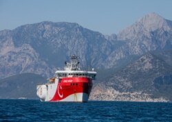 FILE - Turkey's exploratory vessel, the Oruc Reis, is seen anchored in the Mediterranean, off the coast of Antalya, Turkey, July 24, 2020.