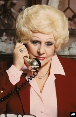 Mary Kay Ash, president of Mary Kay Cosmetics, is seen in her Dallas, Tex., office, Jan. 1982. (AP Photo)