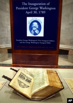 FILE - The Bible used by George Washington, when he took the oath of office as president of the United States, is displayed in the National Archives, Monday, Jan. 10, 2005 in Washington. (AP Photo/Manuel Balce Ceneta)