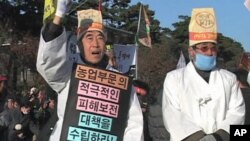 South Korean farmers demand resumption of North Korea food aid to ease rice glut in South