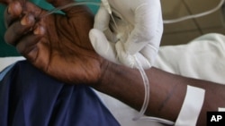 A man receives treatment, at an aids clinic run by Mdecins Sans Frontieres at Kinshasa, Congo, Nov. 1, 2006.