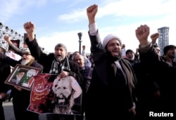 Iranian protesters chant slogans during a demonstration condemning the execution of Shi'ite cleric Sheikh Nimr al-Nimr in Saudi Arabia, at Imam Hussein Square, in Tehran, Jan. 4, 2016.