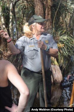 Park ranger Lori Mobbs led Mikah, Andy and a group of tourists on a slog through a cypress forest.