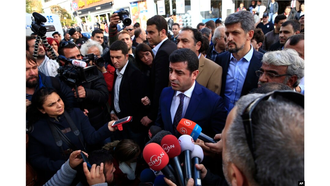 The HDP’s Selahattin Demirtas visits Istanbul headquarters of the Koza-Ipek Holding media company, which police seized in a dawn raid on Oct. 28, 2015. The company is linked to opposition television stations and to Fethullah Gulen, a U.S.-based moderate I