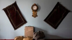 Travel bags from a family of Afghan musicians are packed and stored in a living room in Kabul, Afghanistan, Sept. 23, 2021.