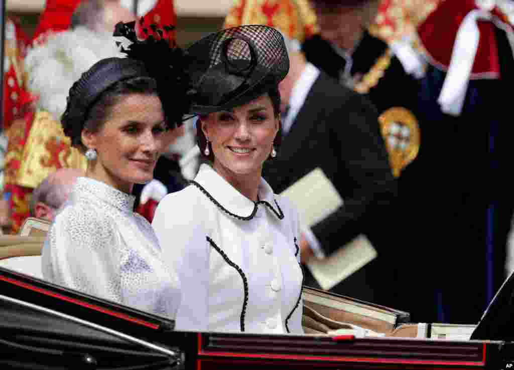 Spain&#39;s Queen Letizia and Britain&#39;s Kate, the Duchess of Cambridge, leave the Order of The Garter Service at Windsor Castle in Windsor, Britain.