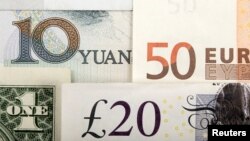 FILE - A picture illustration shows an arrangement of various world currencies including Chinese Yuan, US Dollar, Euro, British Pound.