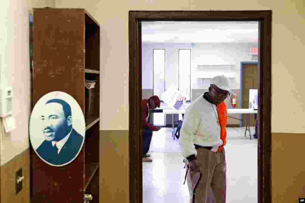 A voter departs a polling place, Feb. 29, 2020, in Charleston, S.C., after voting in the state&#39;s primary. 