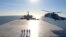 FILE - This image made from a video released Jan. 13, 2021, by the Iranian Army shows a helicopter landing on the Makran logistics vessel during a navy drill. (Iranian Army via AP)