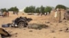 FILE - Damage is seen following an attack by Boko Haram militants in the northeast city of Maiduguri, Nigeria, April 27, 2018. 