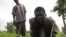 A laborer tends to a field in the Central African Republic, despite his affliction with river blindness. (File)