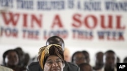 Liberian President Ellen Johnson Sirleaf attends a church service at the Dominion Christian Fellowship Center, in Monrovia, Liberia, November 6, 2011.