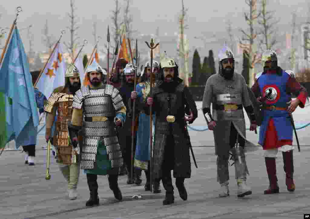 Members of Turkish military guard of honour in historical warrior gear, walk to take their positions prior to a welcome ceremony for Ethiopia&#39;s President Mulatu Teshome Wirtu, scheduled to meet Turkey&#39;s President Recep Tayyip Erdogan, at the Presidential Palace in Ankara, Turkey.