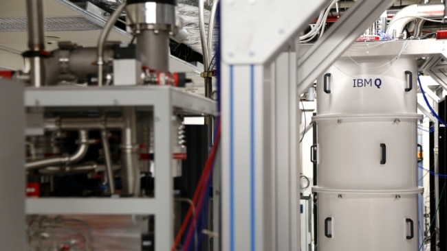 A quantum computer, surrounded by a cooling machine that keeps the temperature close to zero kelvin in the quantum computing lab seen at the IBM Thomas J. Watson Research Center in Yorktown Heights, N.Y. on February 27, 2018. (AP Photo/Seth Wenig)