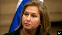 FILE - Former Israeli Foreign Minister Tzipi Livni attends a news conference at the Knesset, Israel's parliament, in Jerusalem.