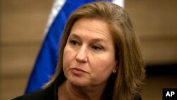 FILE - Former Israeli Foreign Minister Tzipi Livni attends a news conference at the Knesset, Israel's parliament, in Jerusalem.