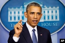 President Barack Obama speaks in the Brady Press Briefing Room of the White House in Washington, Aug. 1, 2014.