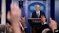 White House Chief of Staff John Kelly decides which reporter to call on during the daily press briefing at the White House in Washington, Oct. 12, 2017.
