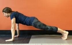 This core exercise is the advanced version of the Plank Pose. (VOA Learning English/Adam Brock)
