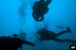 Divers visit a 5th Century B.C. shipwreck near the coast of Peristera, Greece, April 7, 2019.