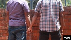 FILE - A Kenyan gay couple is seen holding hands. Homosexuality is illegal in at least 36 African countries, including Kenya. Penalties include prison and fines. (VOA / R. Ombuor)