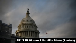 FILE PHOTO: The U.S. Capitol building is pictured at sunset on Capitol Hill in Washington, U.S., November 27, 2019. 