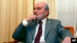 George Blake, seen in this Nov. 15, 2006, is a former British spy and double agent in service of the Soviet Union, seen in Moscow, Russia. Blake, who turns 95 Saturday Nov. 11, 2017 said in a statement carried by the Russian Foreign Intelligence Service that Russian spies now face a task of saving the world. Blake has lived in Russia since his escape from British prison in 1966.