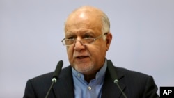 FILE - Iran's Oil Minister Bijan Zanganeh speaks during the Iran Petroleum Contracts Conference in Tehran, Iran, Nov. 28, 2015.