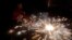 An Indian lights firecrackers to celebrate Diwali, the Hindu festival of lights, in Jammu, India, Oct. 30, 2016. Diwali, a festival of lights celebrated by Hindus, Sikhs, Jains and others in India and other countries, is starting to light up mainstream America.