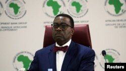 FILE PHOTO: Akinwumi Ayodeji Adesina, President of the African Development Bank Group, attends a meeting of the 2020 African Economic Outlook report in Abidjan